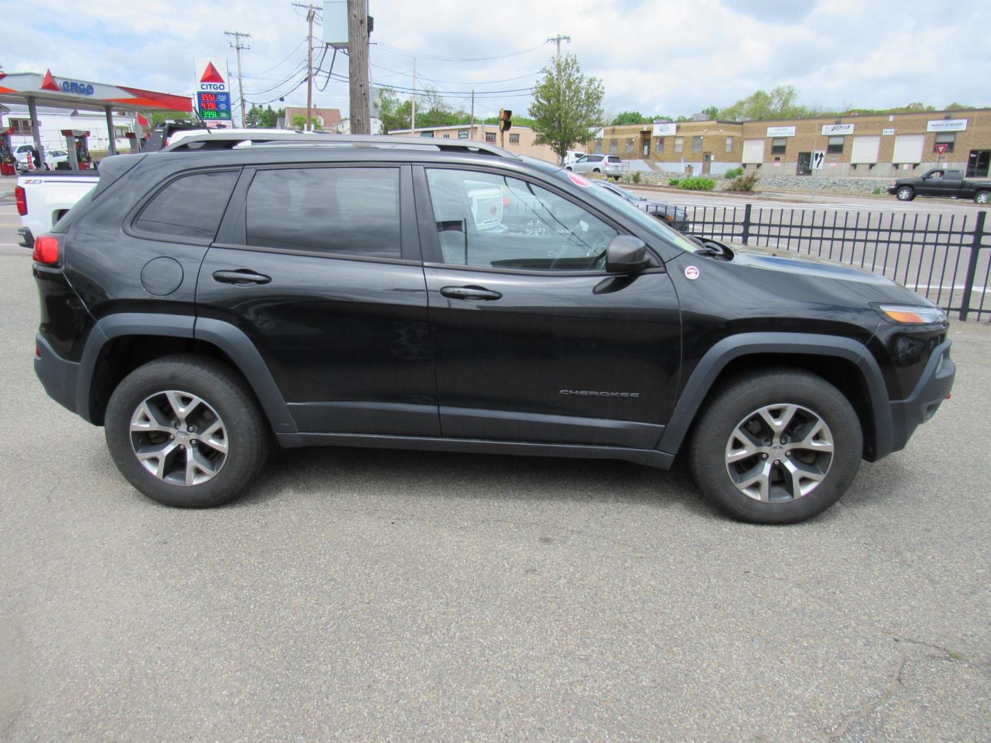 2014 BLACK /Black Jeep Cherokee Trail Hawk (1C4PJMBS0EW) , Automatic transmission, located at 215 Milton St, Dedham, MA, 02026, (781) 329-5144, 42.241905, -71.157295 - This nice compact SUV is in excellent condition.Runs like new. All ASPI Motor Cars vehicles are fully serviced before they are delivered to assure the highest quality used vehicles. Comes with a 3/3 warranty included in the price. Call for details. Prices on all vehicles do not include $299.95 - Photo#7